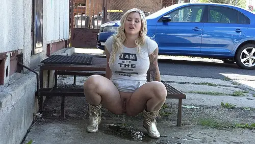 Big boobed blonde pissing
