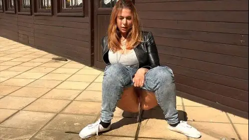 Squatting In Jeans