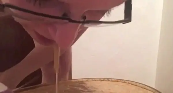 Bikini Girl Puking in a Bowl