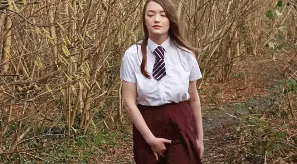 Walking through the woods on her way home and relieve
