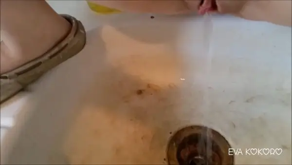 eva-kay – Peeing in the kitchen sink