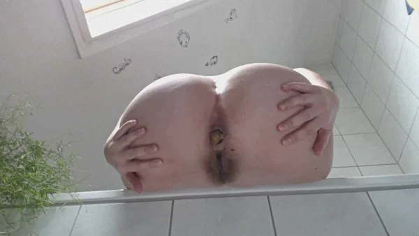 Shitting Naked over Edge of the Tub