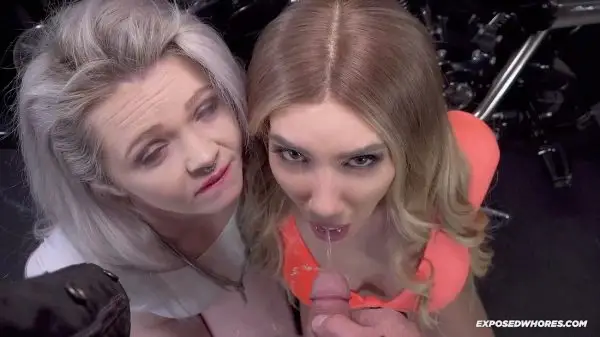Two horny sluts get pissed on and fucked by biker